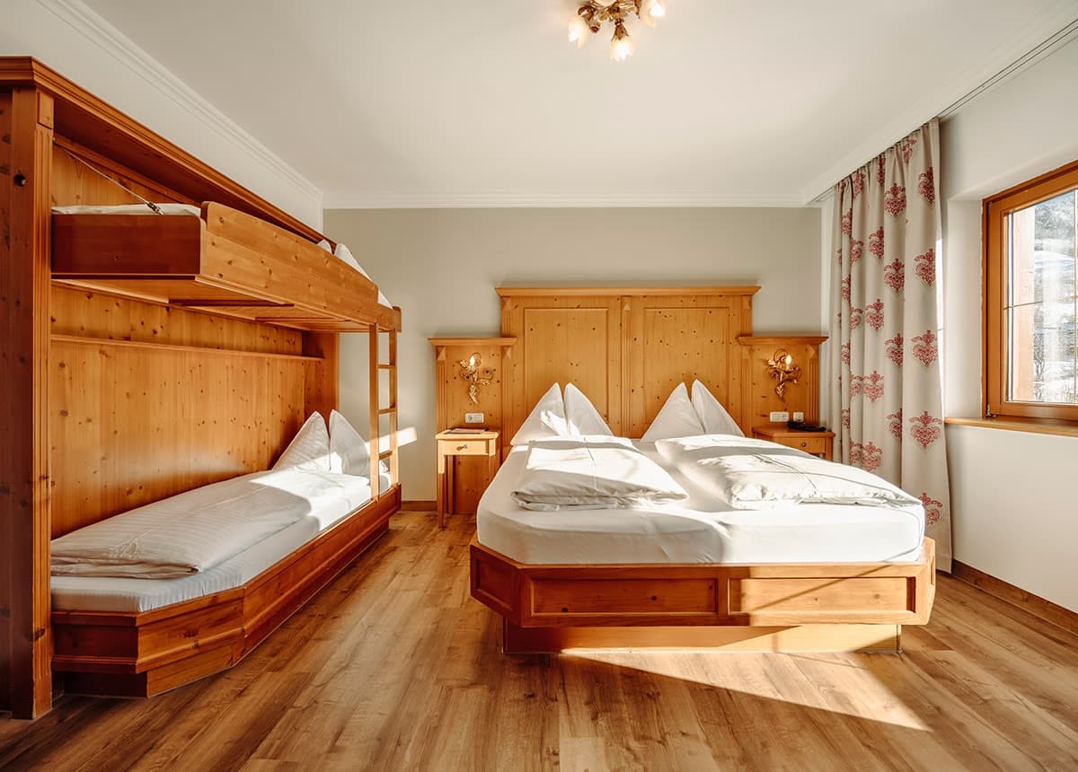 Vierbett- oder Dreibettzimmer