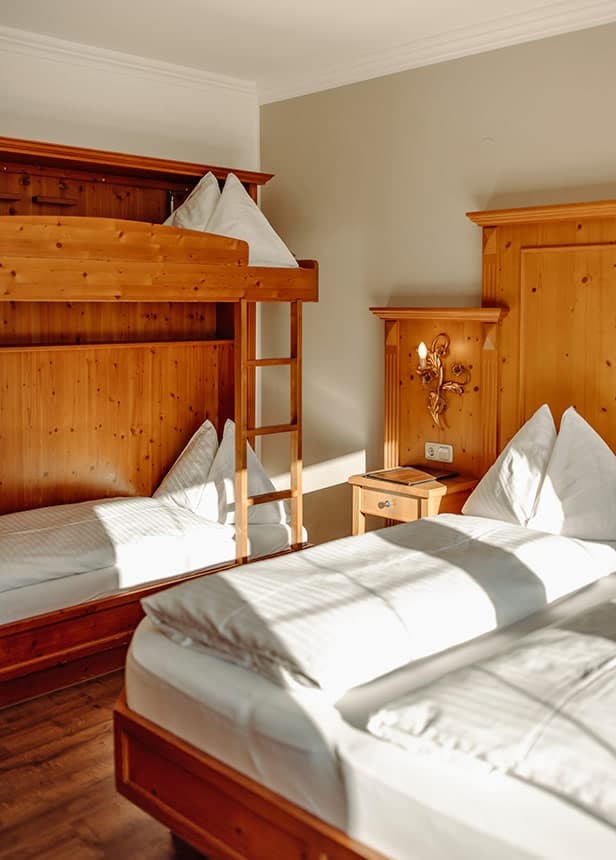 Vierbett- oder Dreibettzimmer