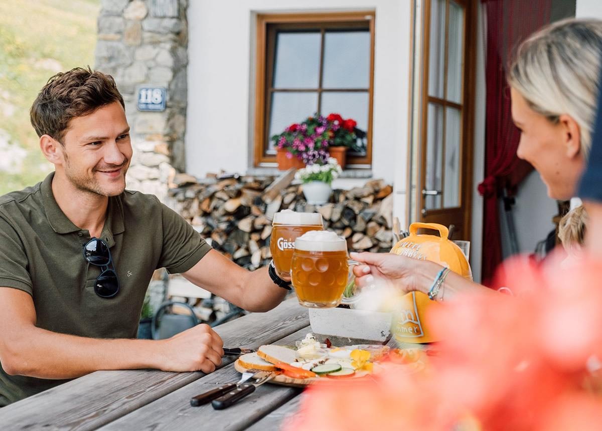 Sitzen im Gastgarten